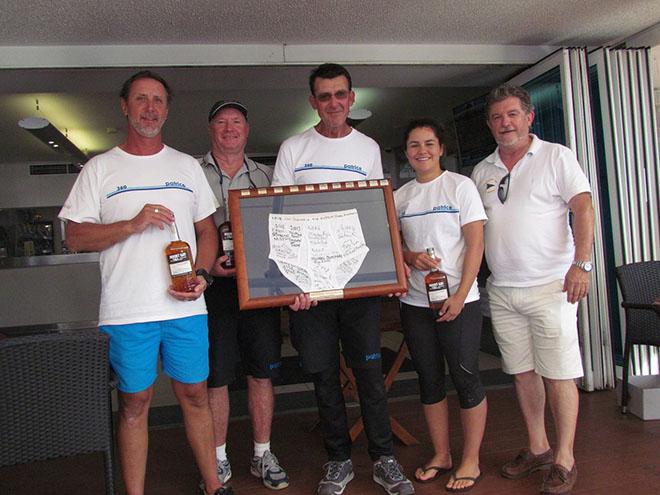 Winner Tony Kirby (holding Mt Gay Top Jocks trophy) and crew with CYCA Director, John Markos © CYCA Staff .